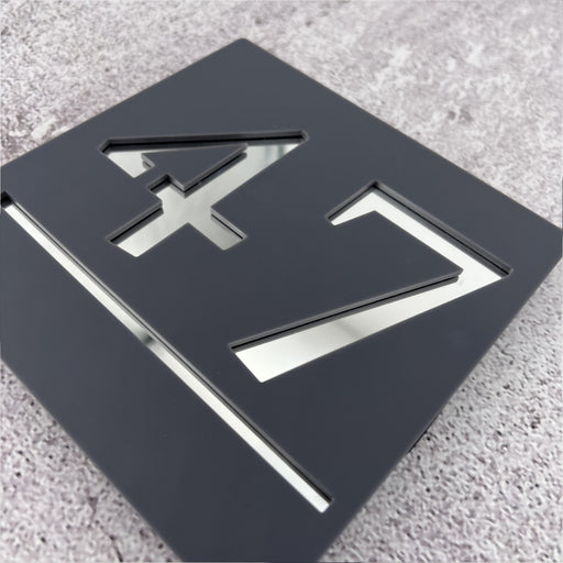 square laser cut house number sign with silver mirror text