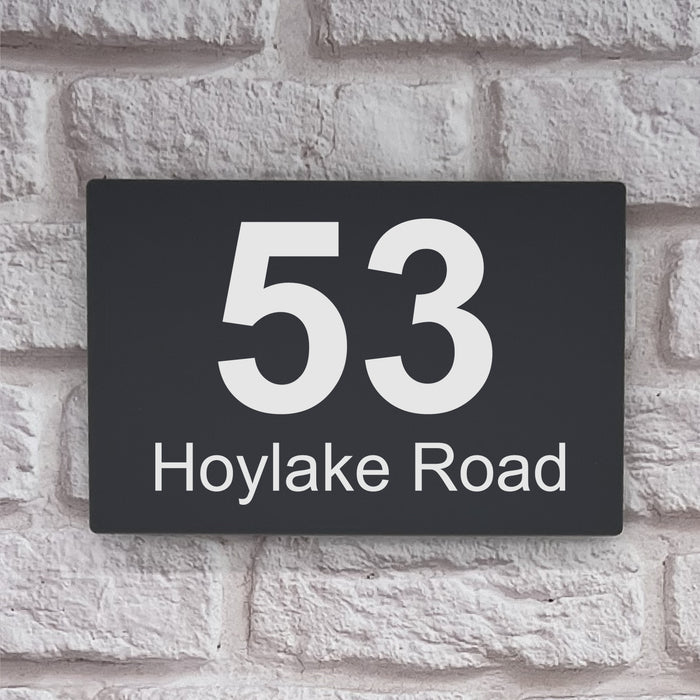 grey acrylic house number sign