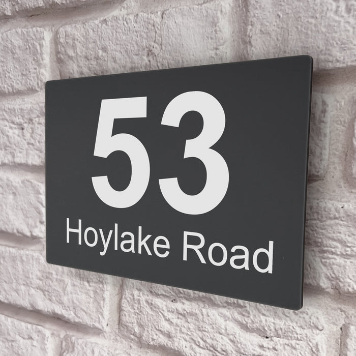 grey acrylic house number sign