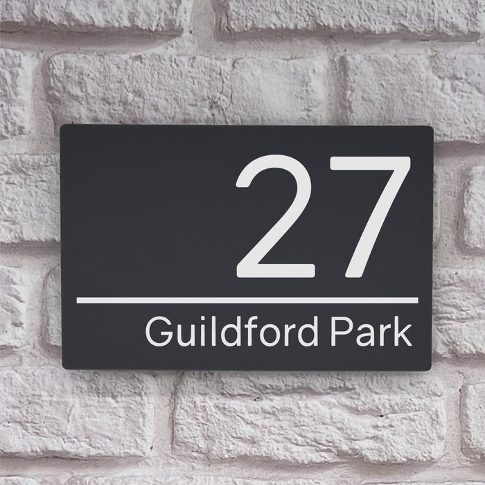 grey acrylic house number sign