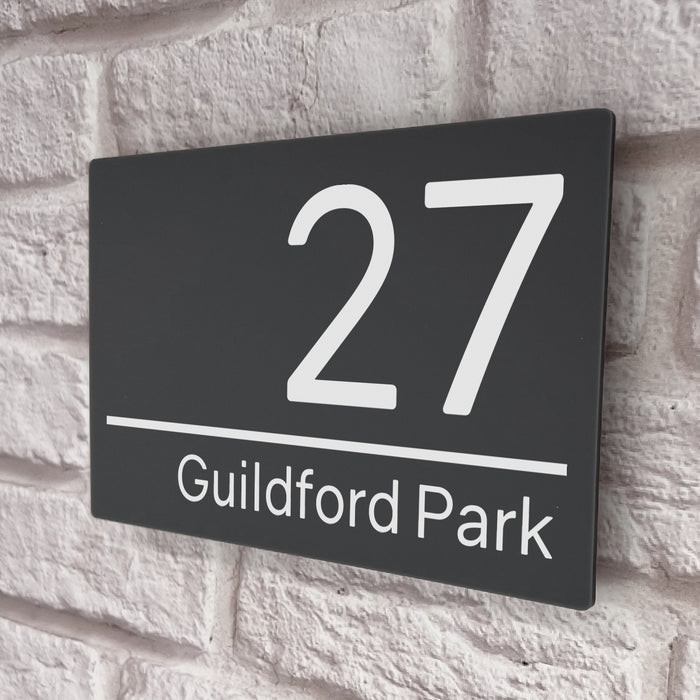 grey acrylic house number sign