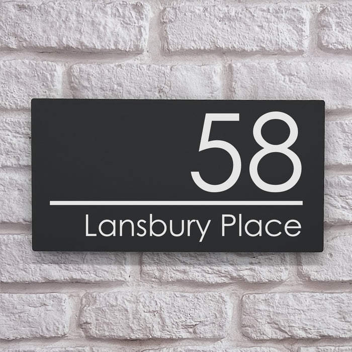 large grey acrylic house number sign