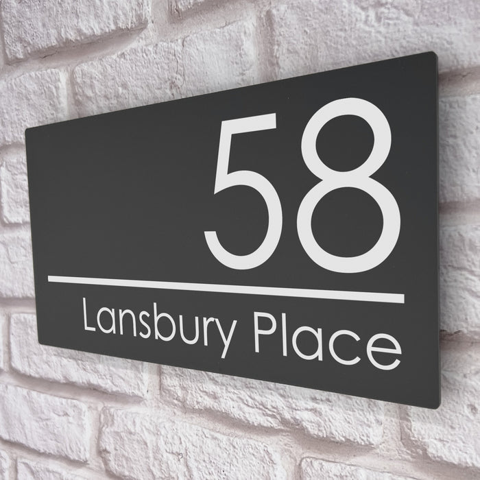 large grey acrylic house number sign