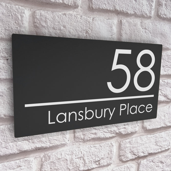 large grey acrylic house number sign