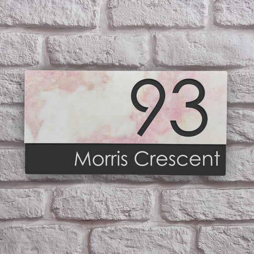 house sign with pink marble effect