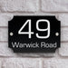 house number sign in high black gloss