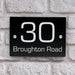 house number sign in high black gloss