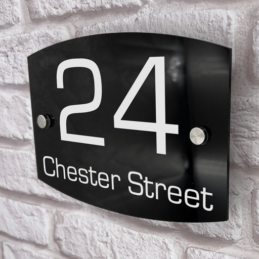 round curve house number sign in high black gloss