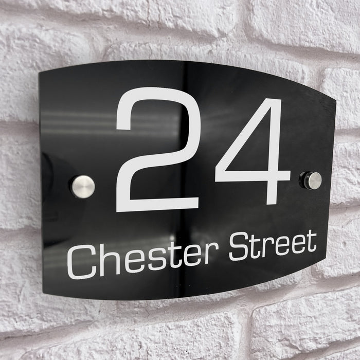 round curve house number sign in high black gloss